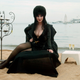 Elvira hits the beach at the 56th International Cannes Film Festival on May 17, 2003.